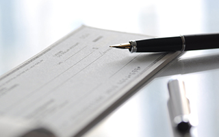 checkbook and pen